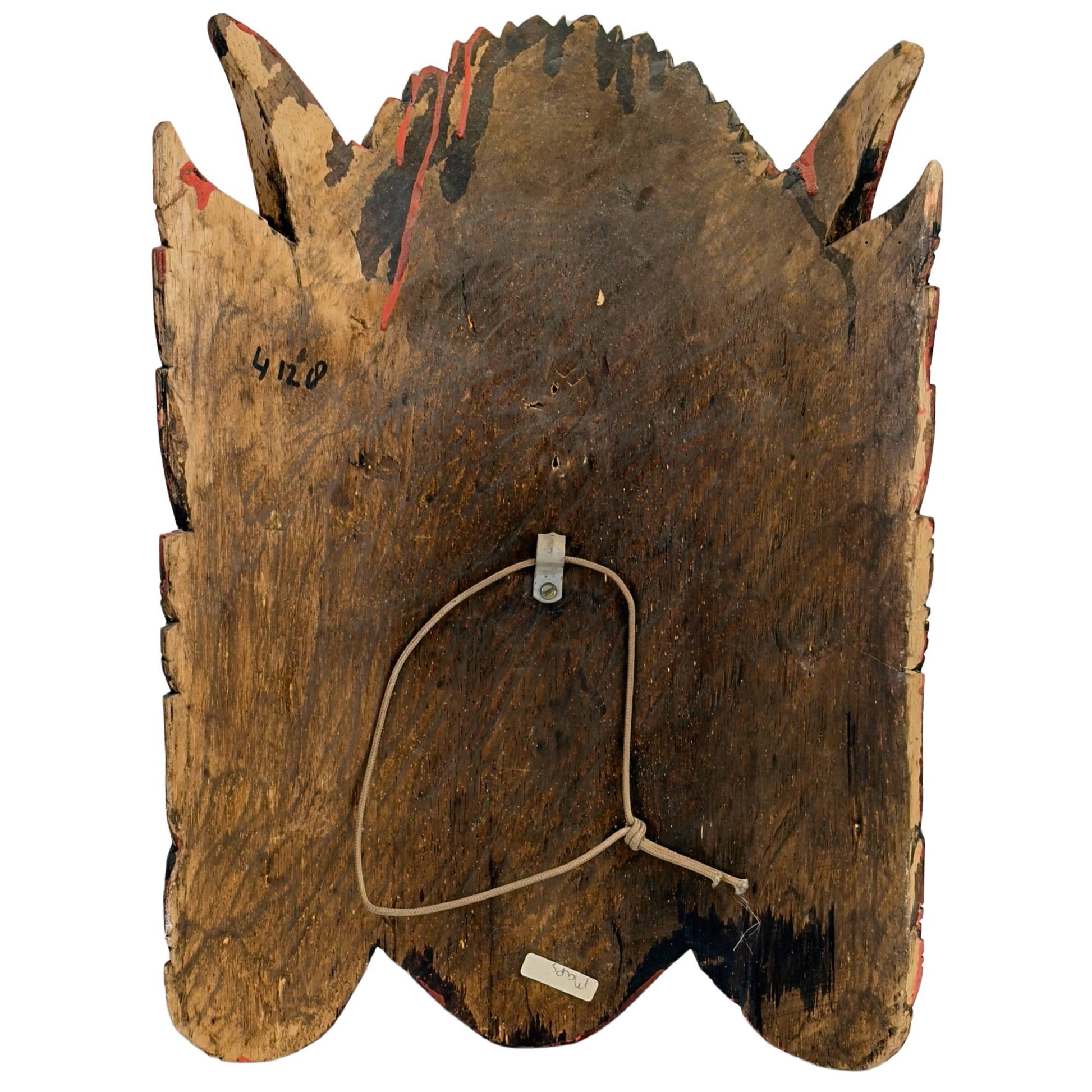 The reverse side of the Dewi Sinta mask with the deep, dark ceremonial wear patina of skin oils.