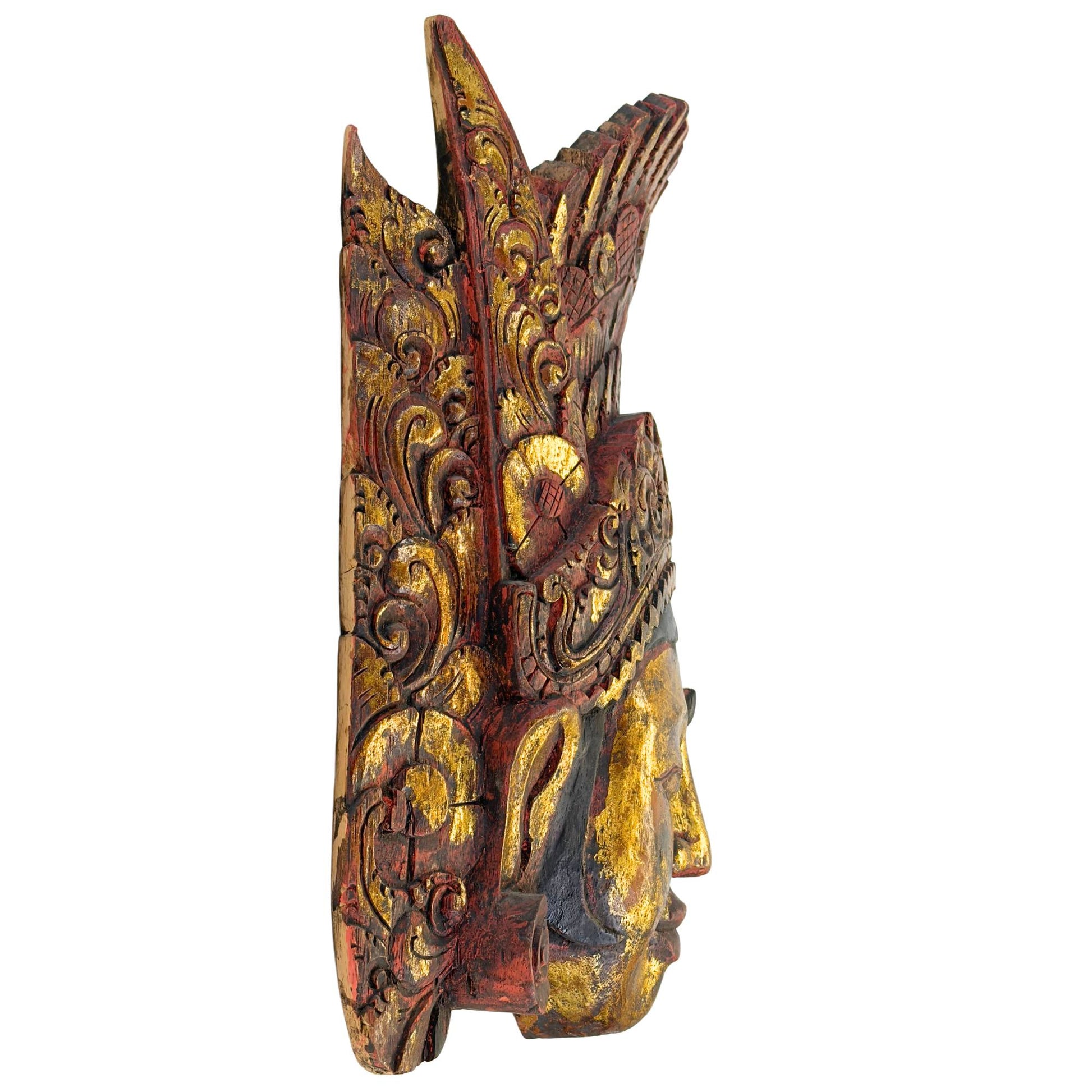 Right profile of the Balinese Dewi Sinta mask, showing the depth of the artisanal high-relief woodcarving in the royal tiara.