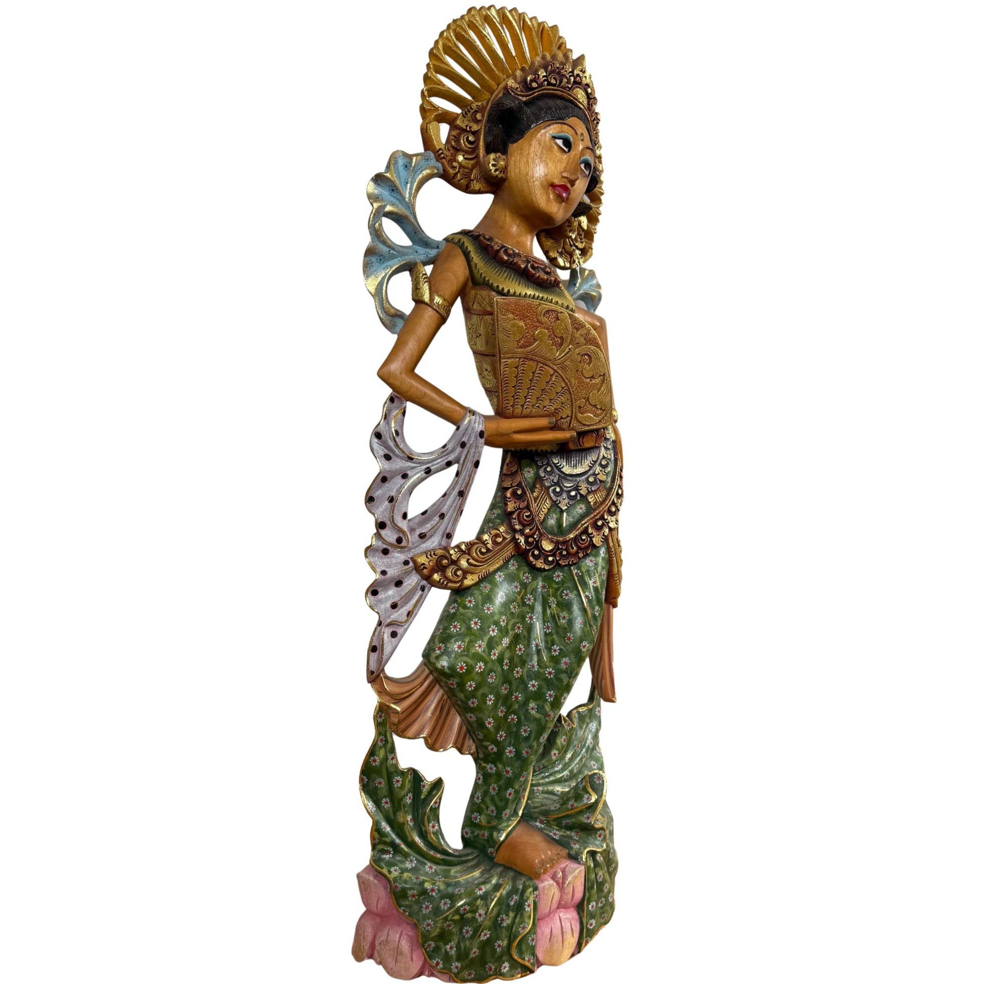 Detail of the radiant sun crown (Cili) on the dancer, representative of enlightenment and spiritual purity.