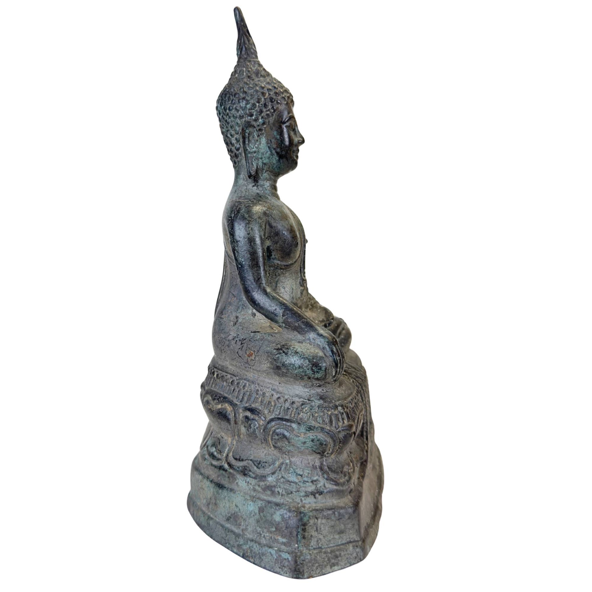 Buddha in the mudra of enlightenment with the hand touching the earth.