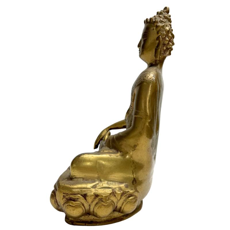 Tibetan Buddhist statue in Bhumisparsha mudra executed in solid bronze.