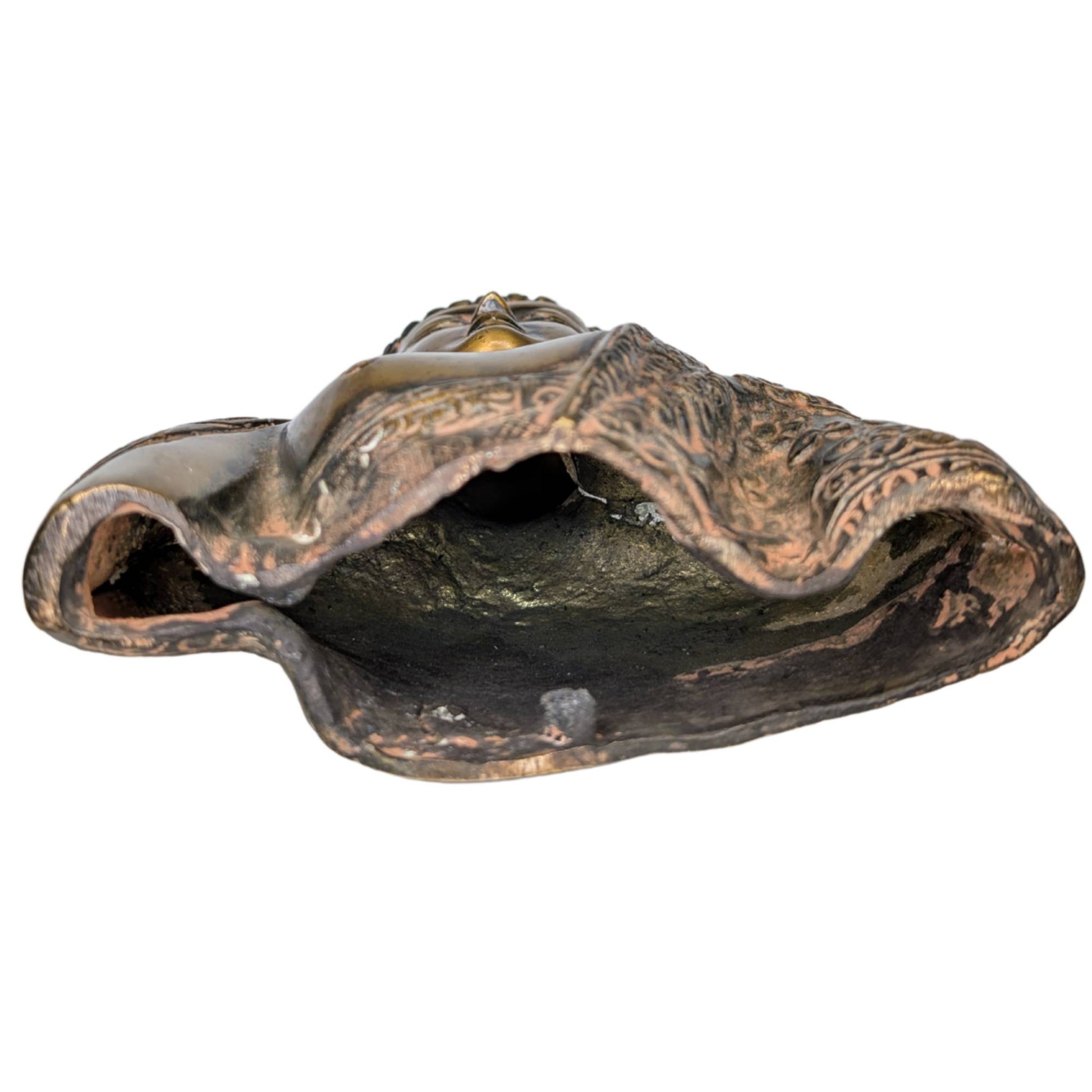 View into the hollow interior of the bust to illustrate the wall thickness and casting method.