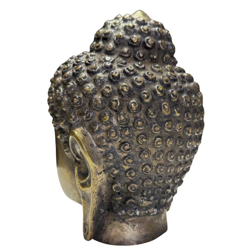 Antique bronze Buddha head from Burma with signs of wear