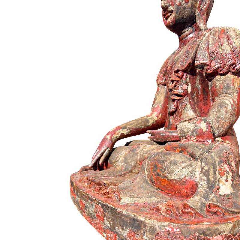 Wooden Buddha statue from a Burmese temple tradition
