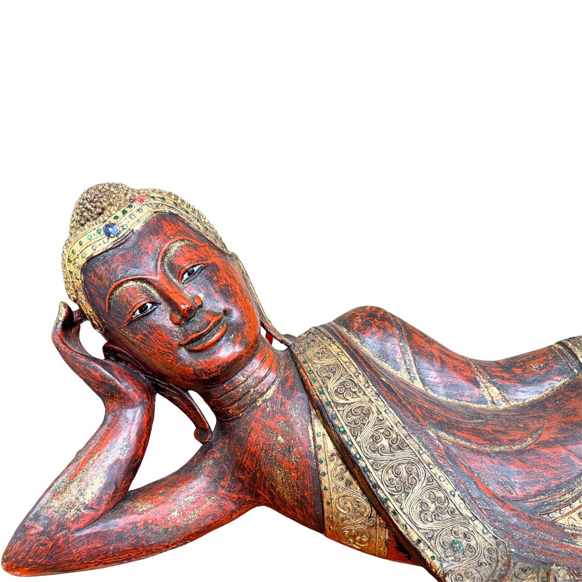 Close-up of the detailed wooden headdress of the Burmese Buddha for Tuesday