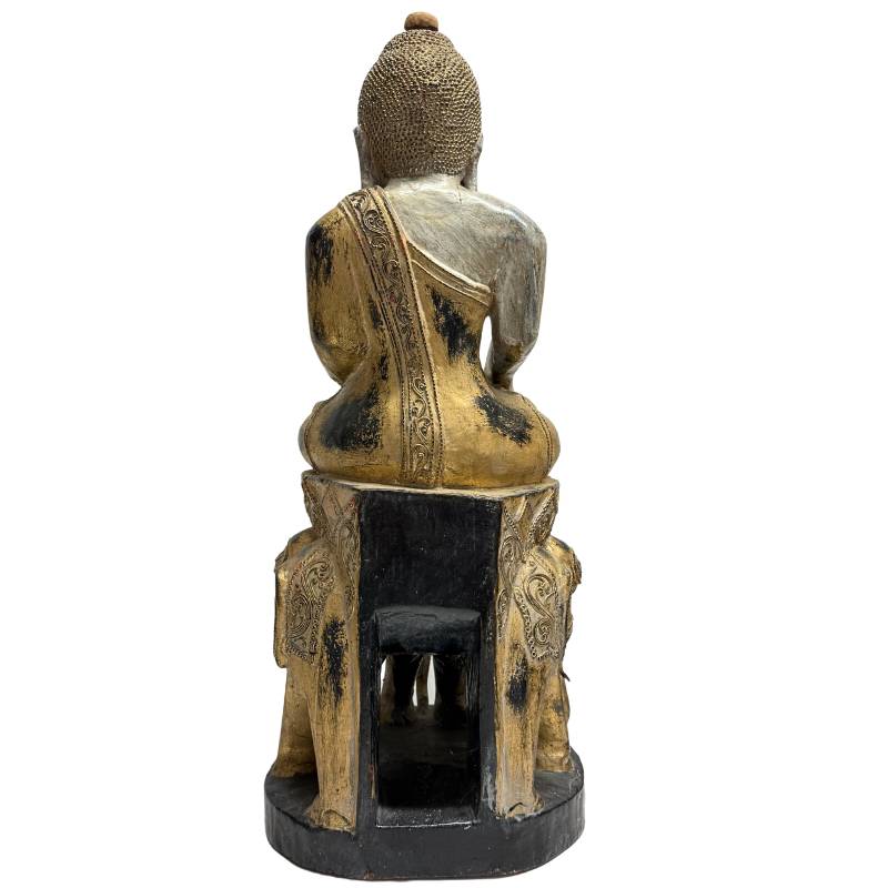 Burmese wooden Buddha statue with traditional leaf gilding