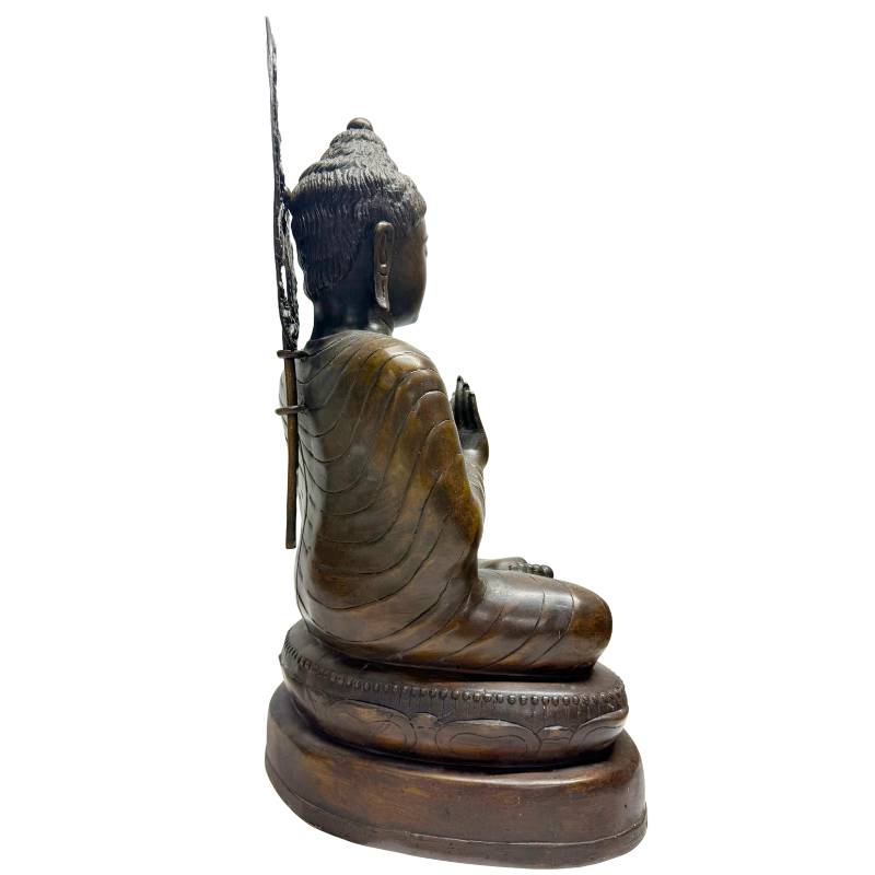 Burmese Buddha Dharmachakra Mudra bronze statue hand detail with wheel symbol teaching posture