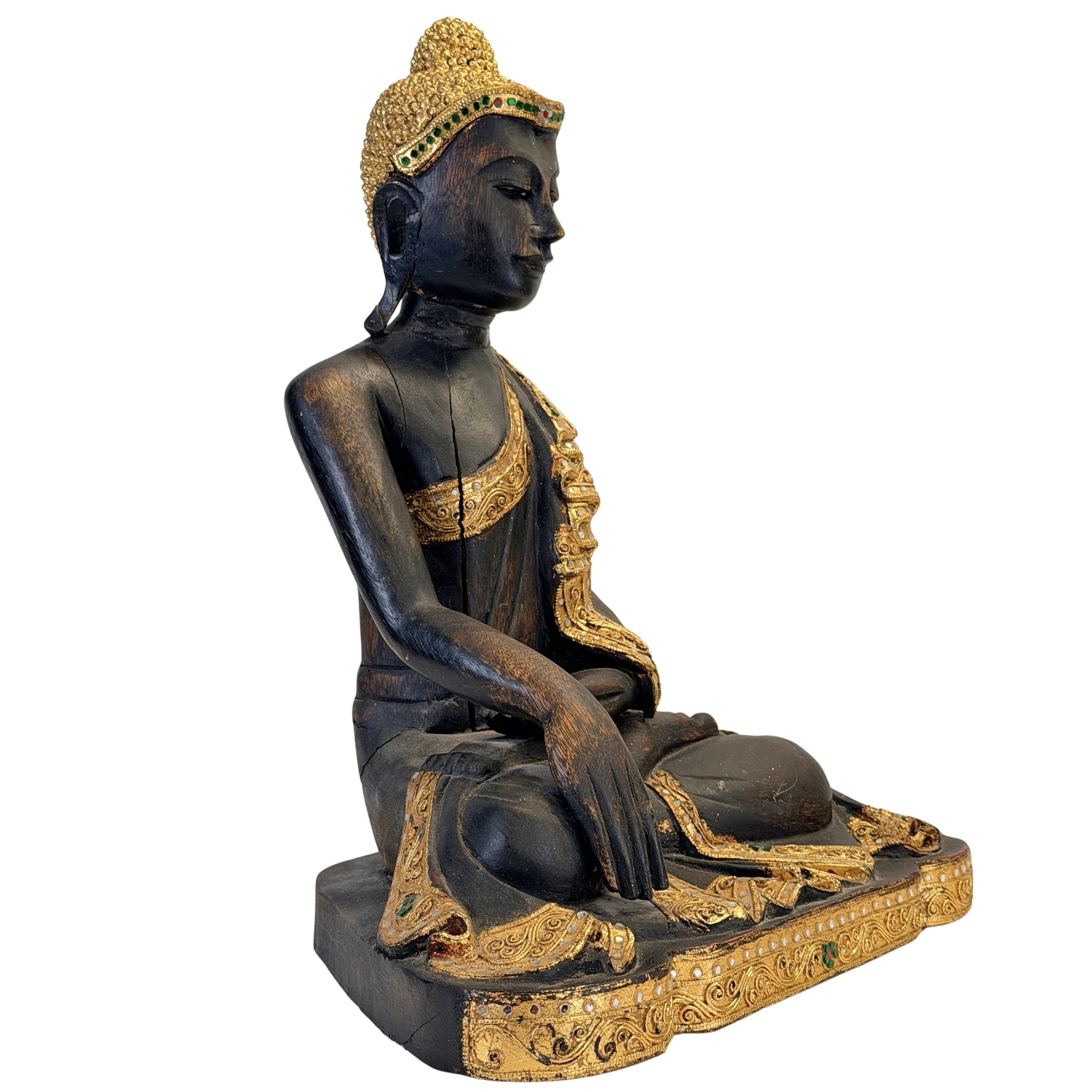 Antique Burmese Buddha viewed from the right with gilded robe and glass inlay