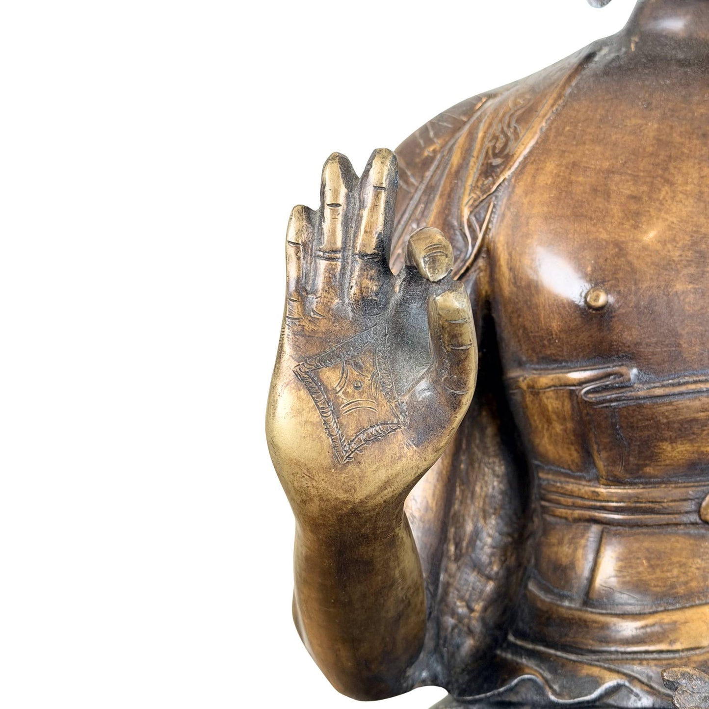 Fire-gilded bronze Buddha in abhaya mudra, symbol of protection, reassurance, and spiritual power