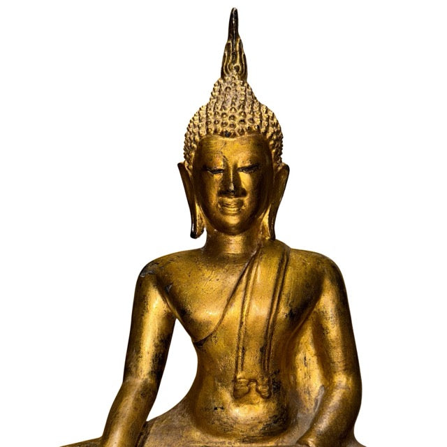 Buddha statue representing grounding, protection, balance, and positive energy in the home