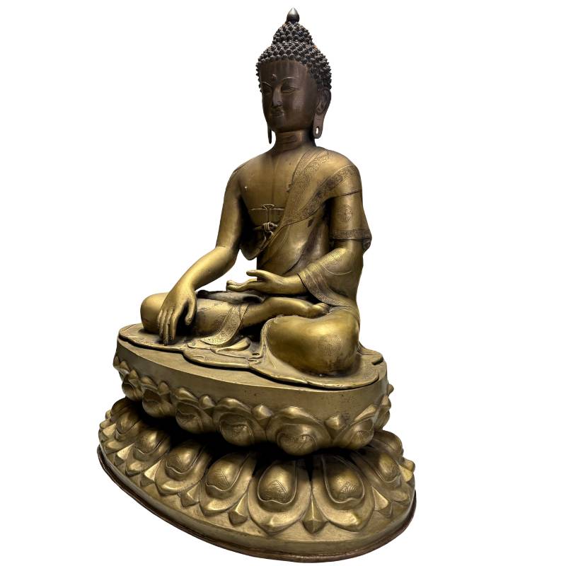 Bronze Buddha statue on a lotus throne from Ladakh with wear