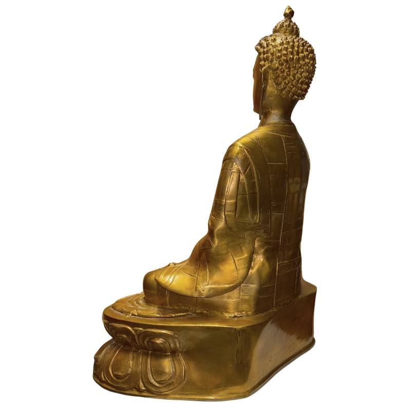 Buddha statue with old gilding, ritual wear, and visible painstaking work