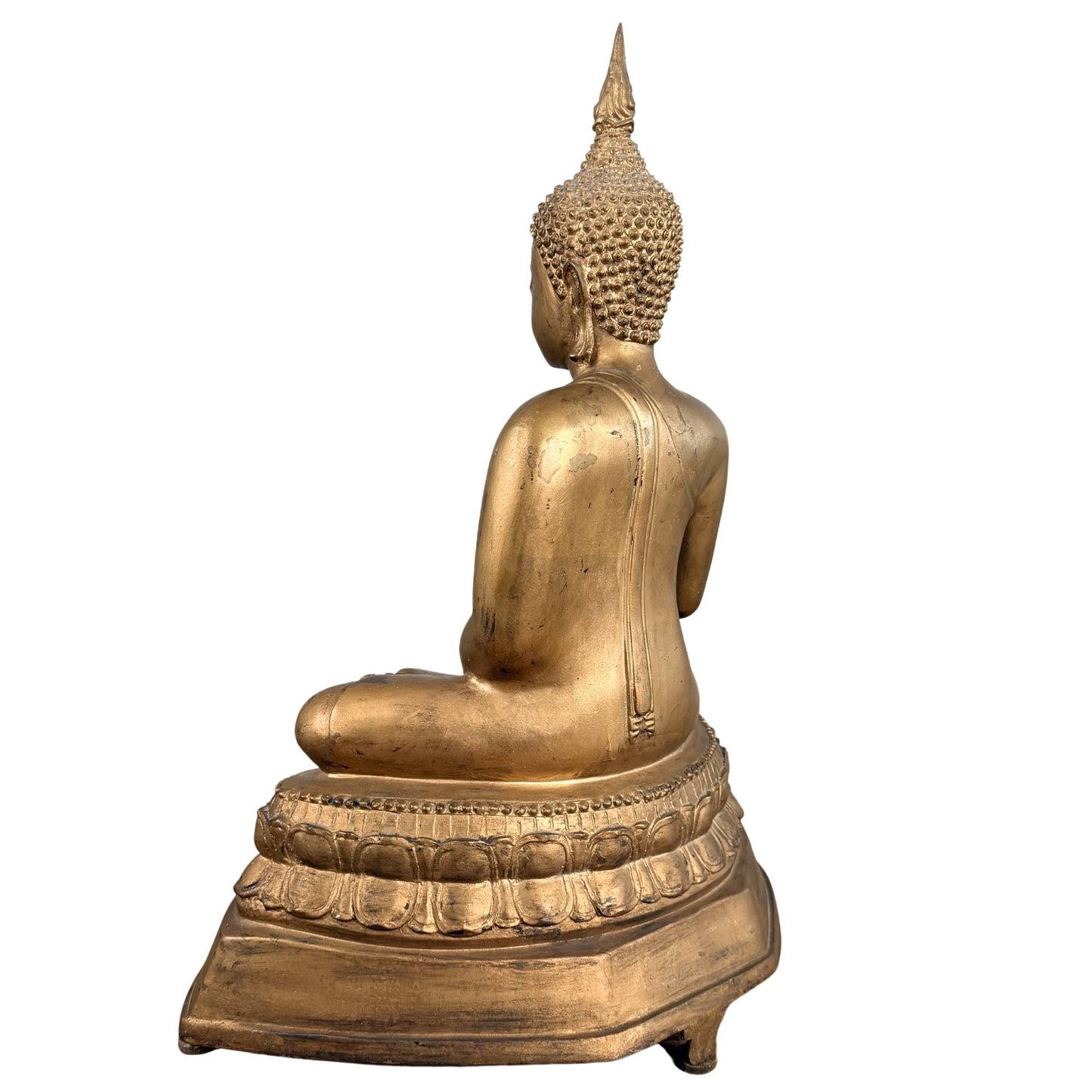 Buddha statue from Thailand with gilded finish and visible signs of age