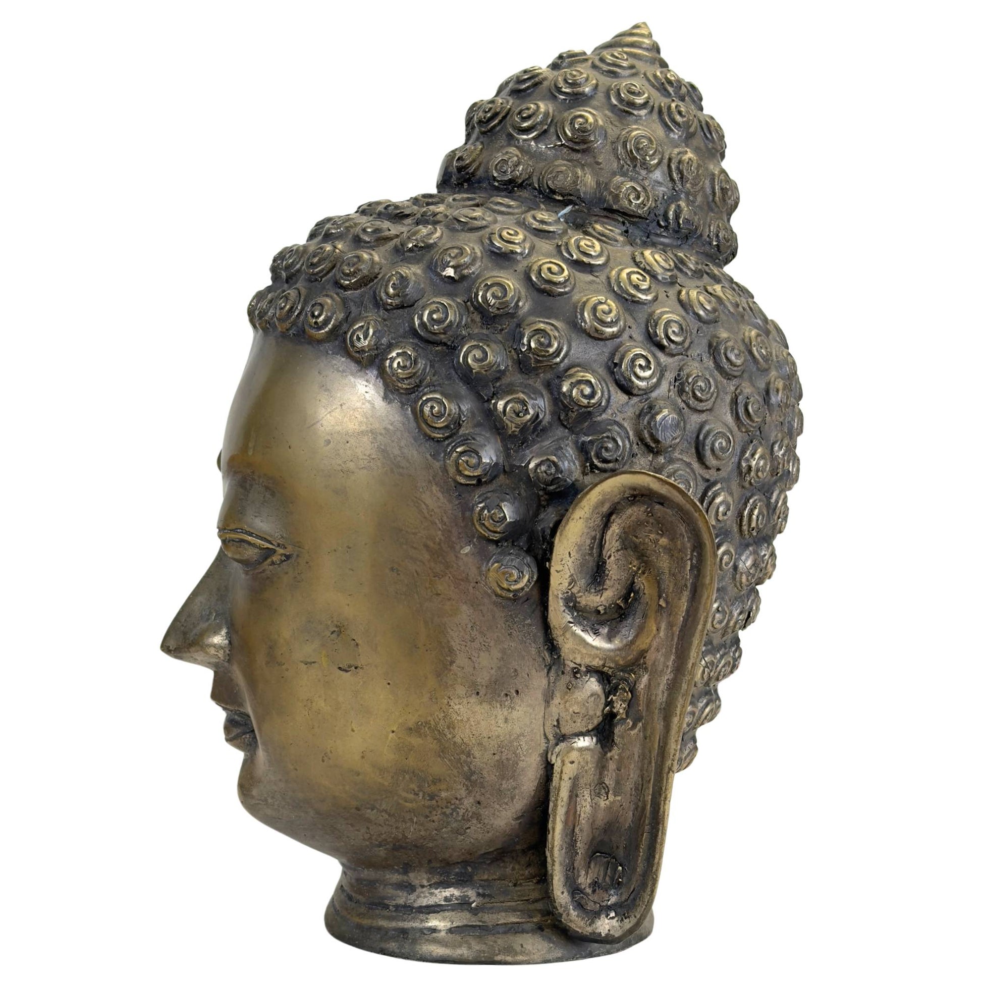 Bronze Buddha head with golden-brown patina and dark accents