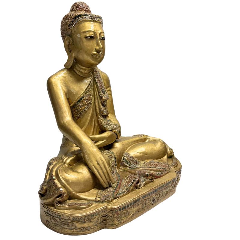 Wooden Buddha statue with a characterful face
