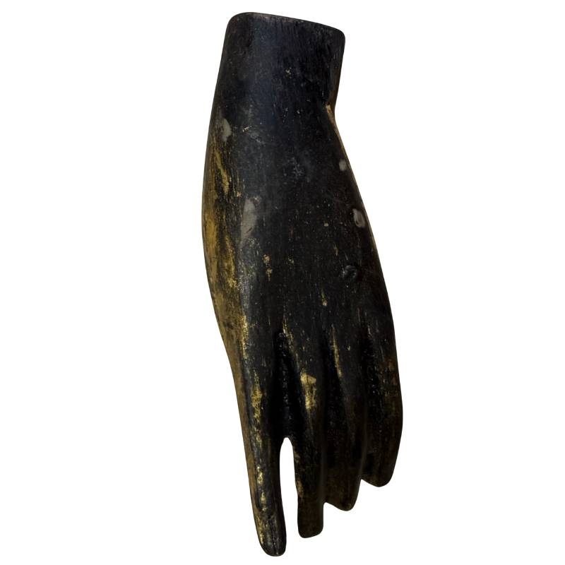 Detached hand of antique Mandalay Buddha statue with old gilding and signs of wear