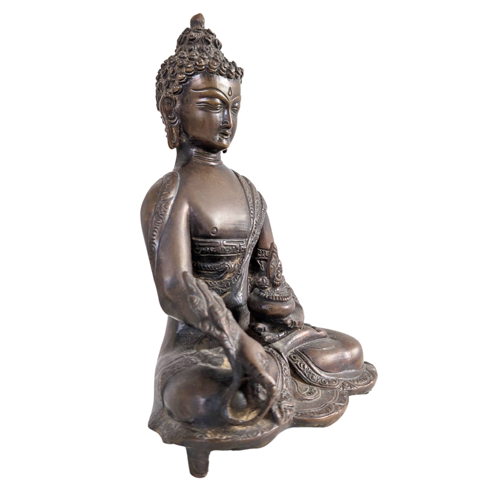 Medicine Buddha holding the Myrobalan plant and a pot of healing nectar.