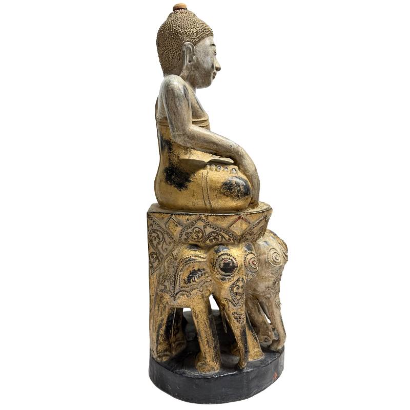 Buddha statue from Burma sitting on an elephant throne