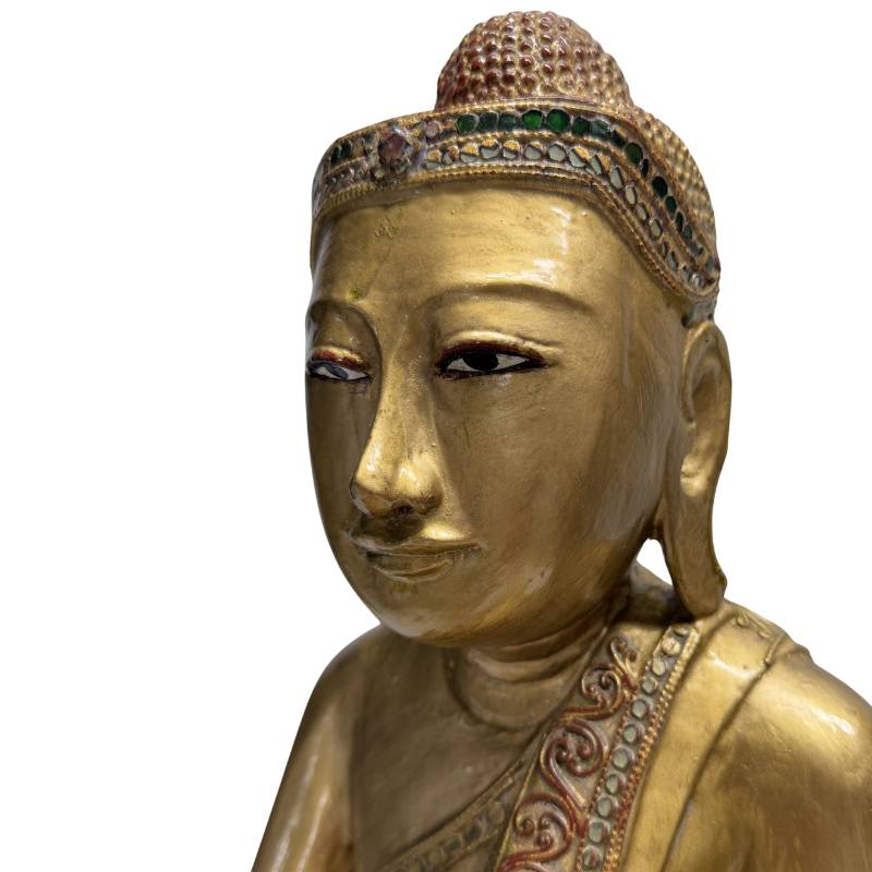 Hand-carved wooden Buddha statue in Myanmar style

