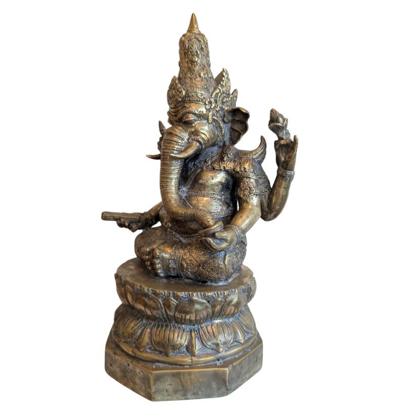 Ganesha statue with Buddhist and Hindu iconography