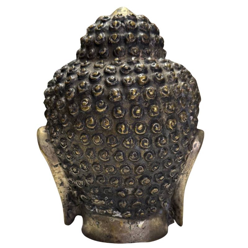 Buddhist bronze head with gold color and patina