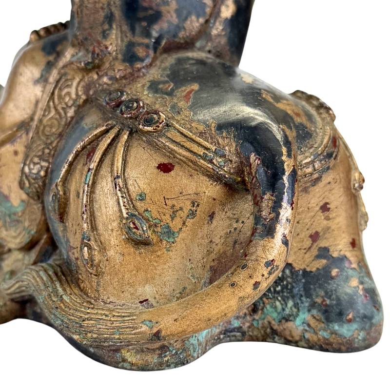 Buddhist Arhat on a buffalo in the Himalayas bronze statue