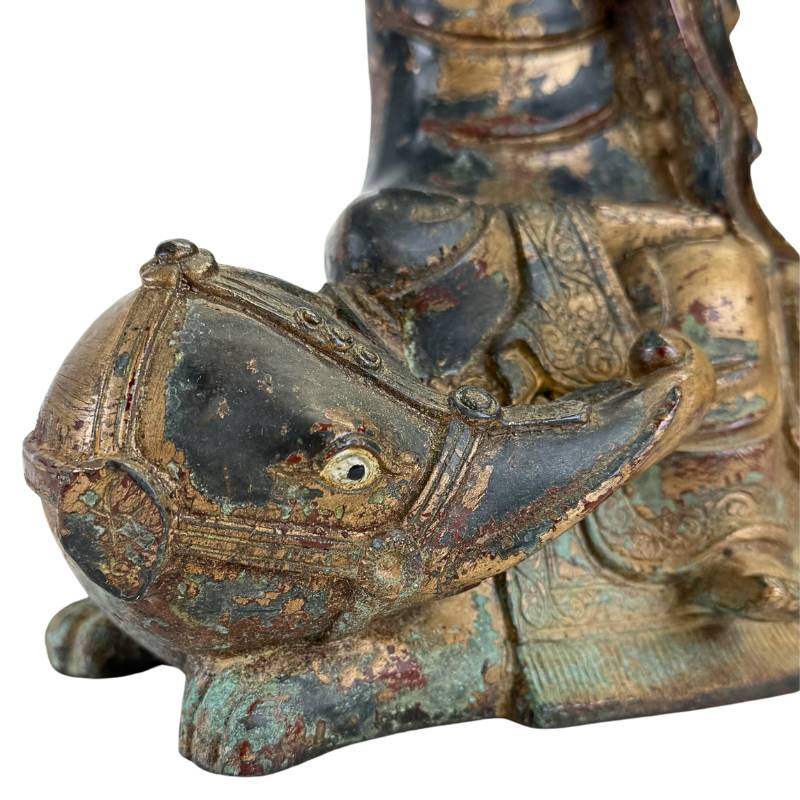 Buddhist Arhat on an animal in bronze Himalayan sculpture