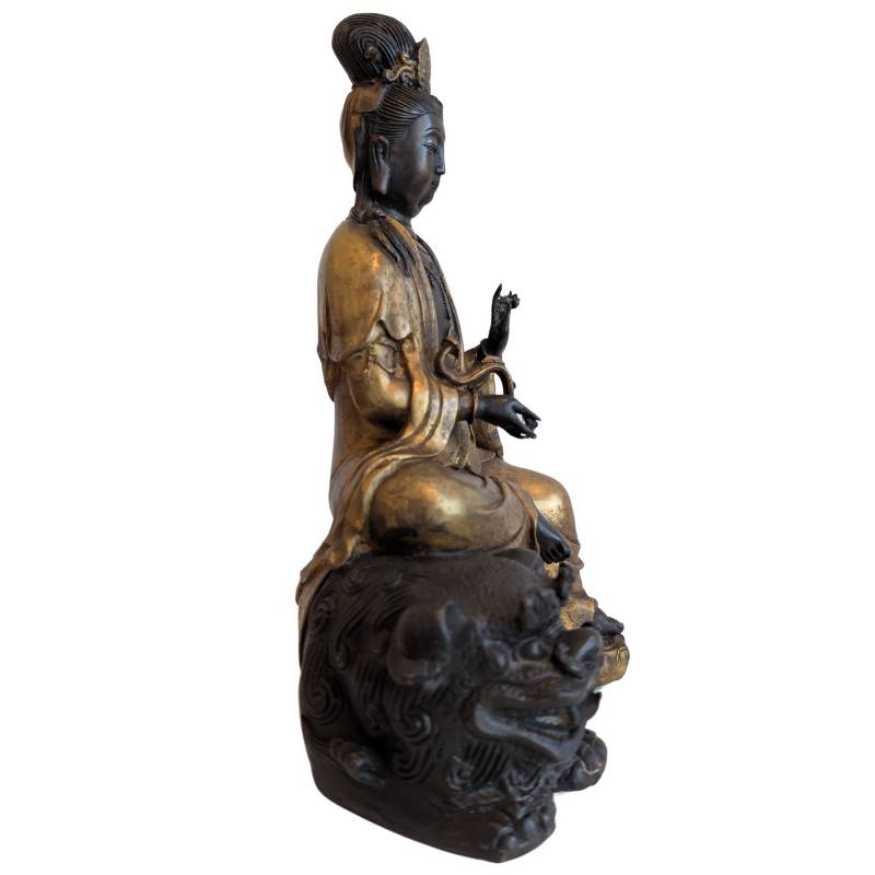 Buddhist Guanyin with bronze lion
