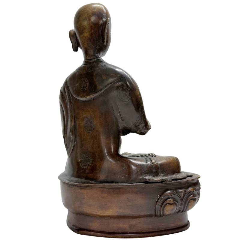Buddhist lama in bronze with natural patina