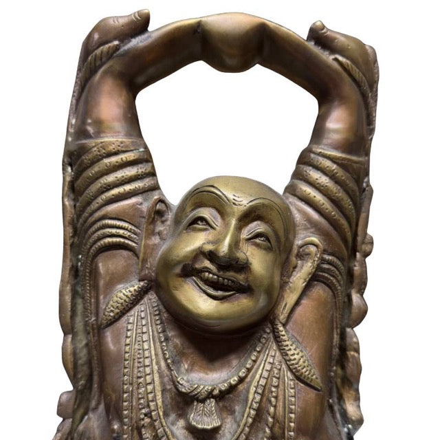 Top view showing the details of the raised hands and head.