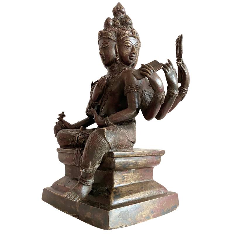 Detail of hands and attributes of a six-armed Brahma statue in bronze