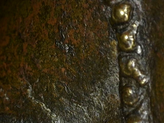 Microscopic view of casting structure and old residue in Brahma image