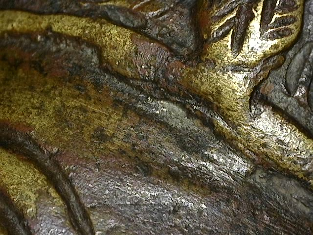 Microscopic tool marks and manual wax modeling on a Brahma statue