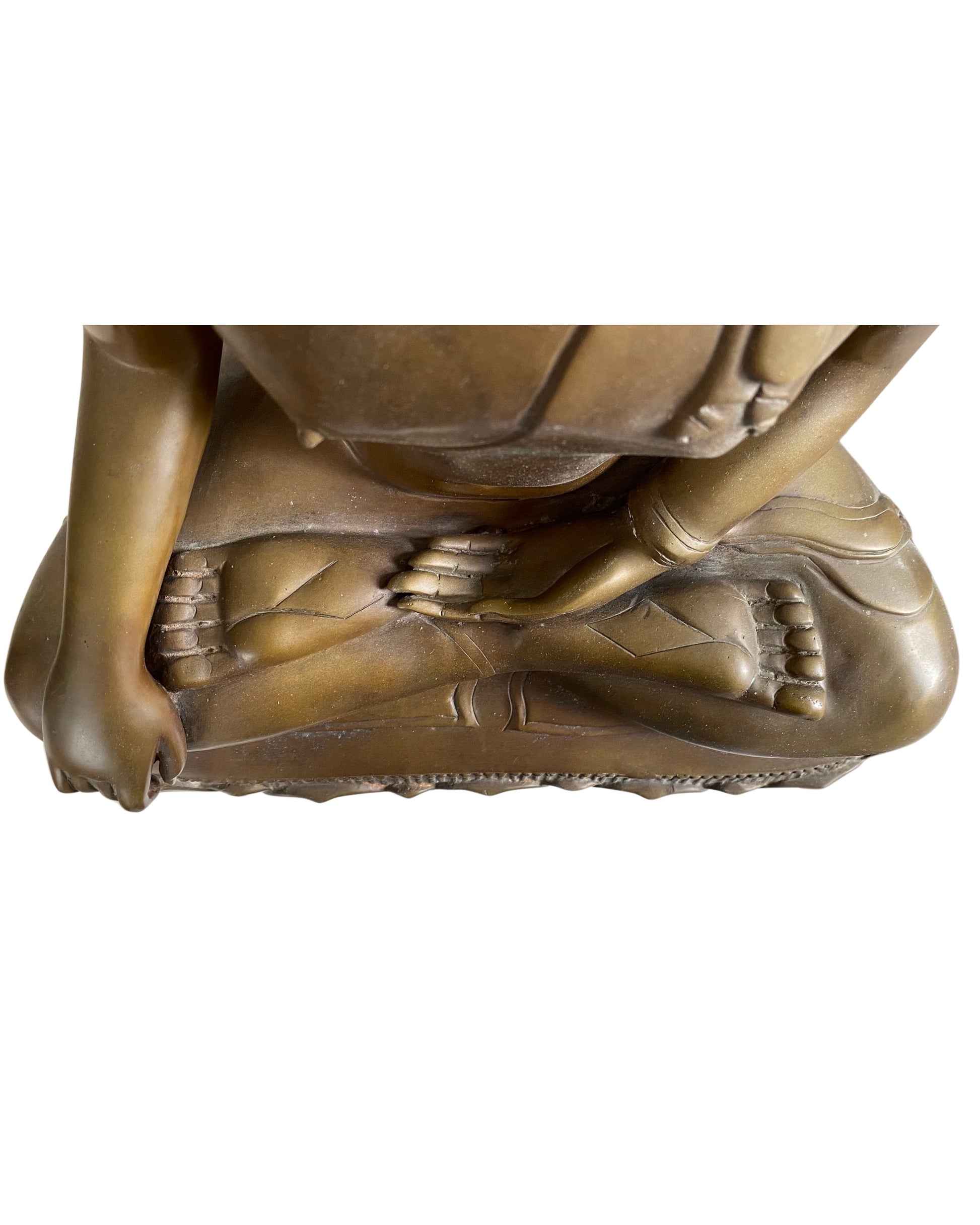 Detail of the 38 cm wide lotus base of a seated Thai Buddha statue.