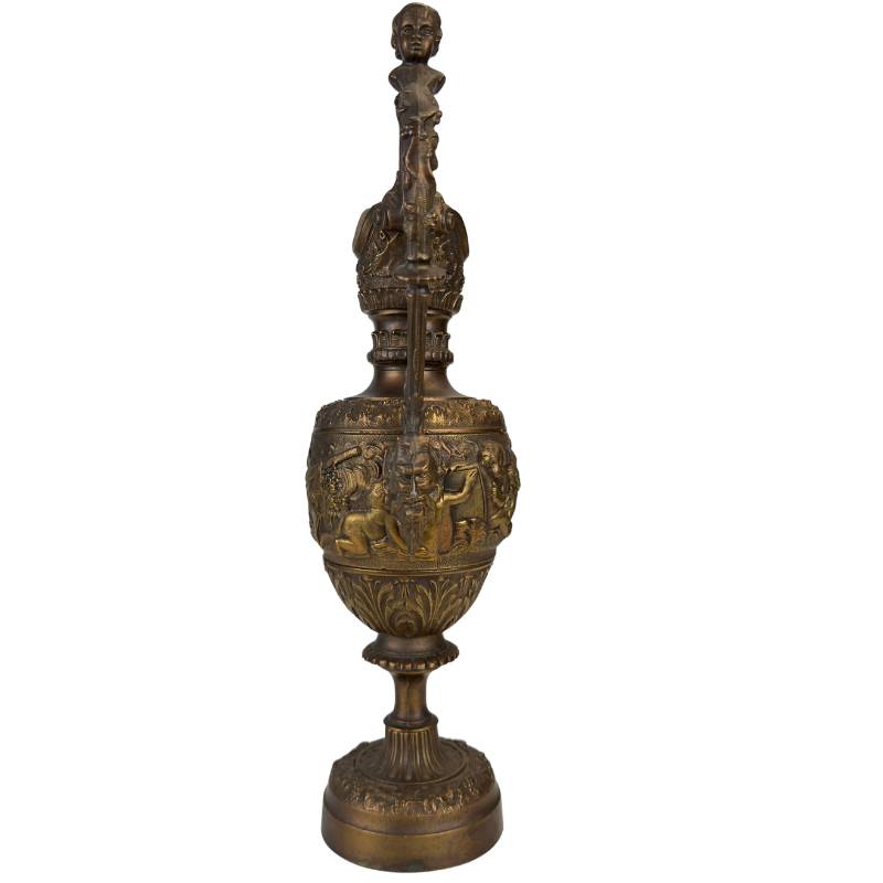 Bronze Bacchus jug with cherubs and figurative relief