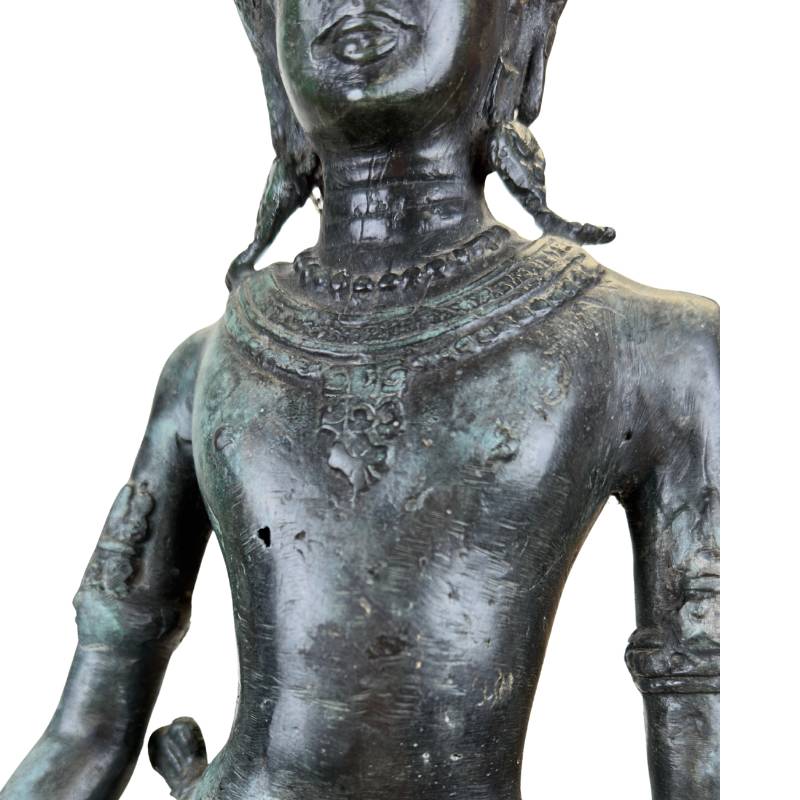 bronze statue with Khmer influence and temple-style appearance