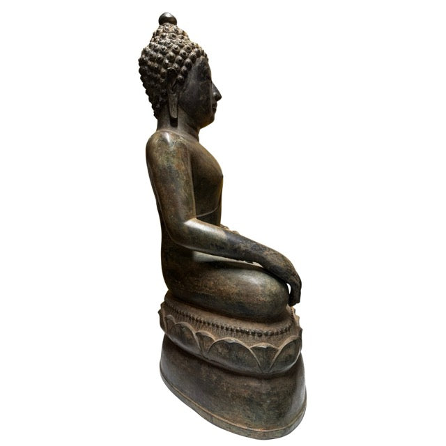 Bronze Buddha in Bhumisparsha mudra as a symbol of steadfastness, protection, and enlightenment
