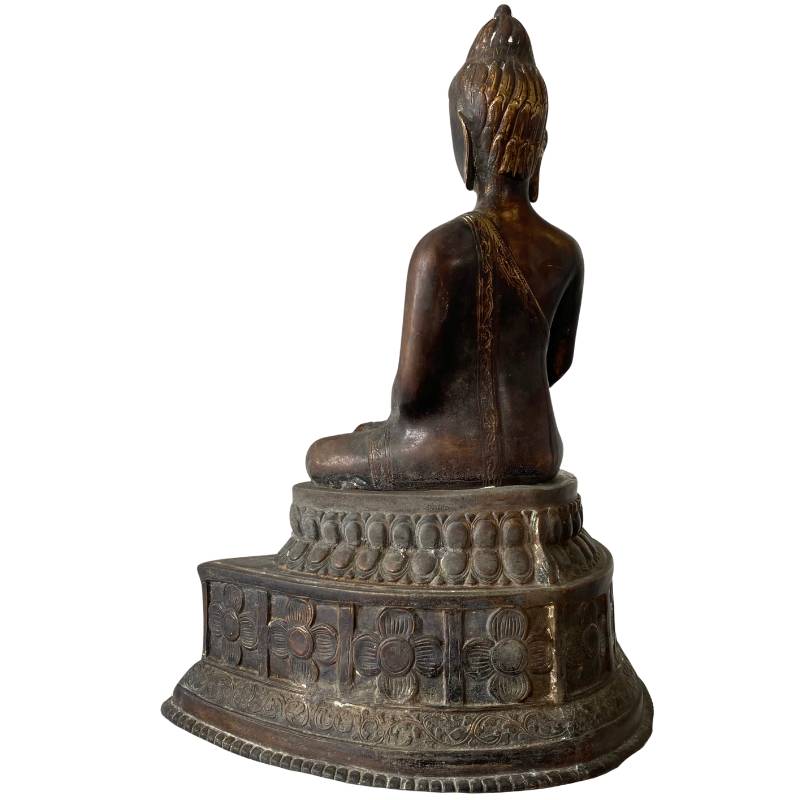 Detail of Himalayan bronze Buddha with gilding and patina texture, dhyana mudra