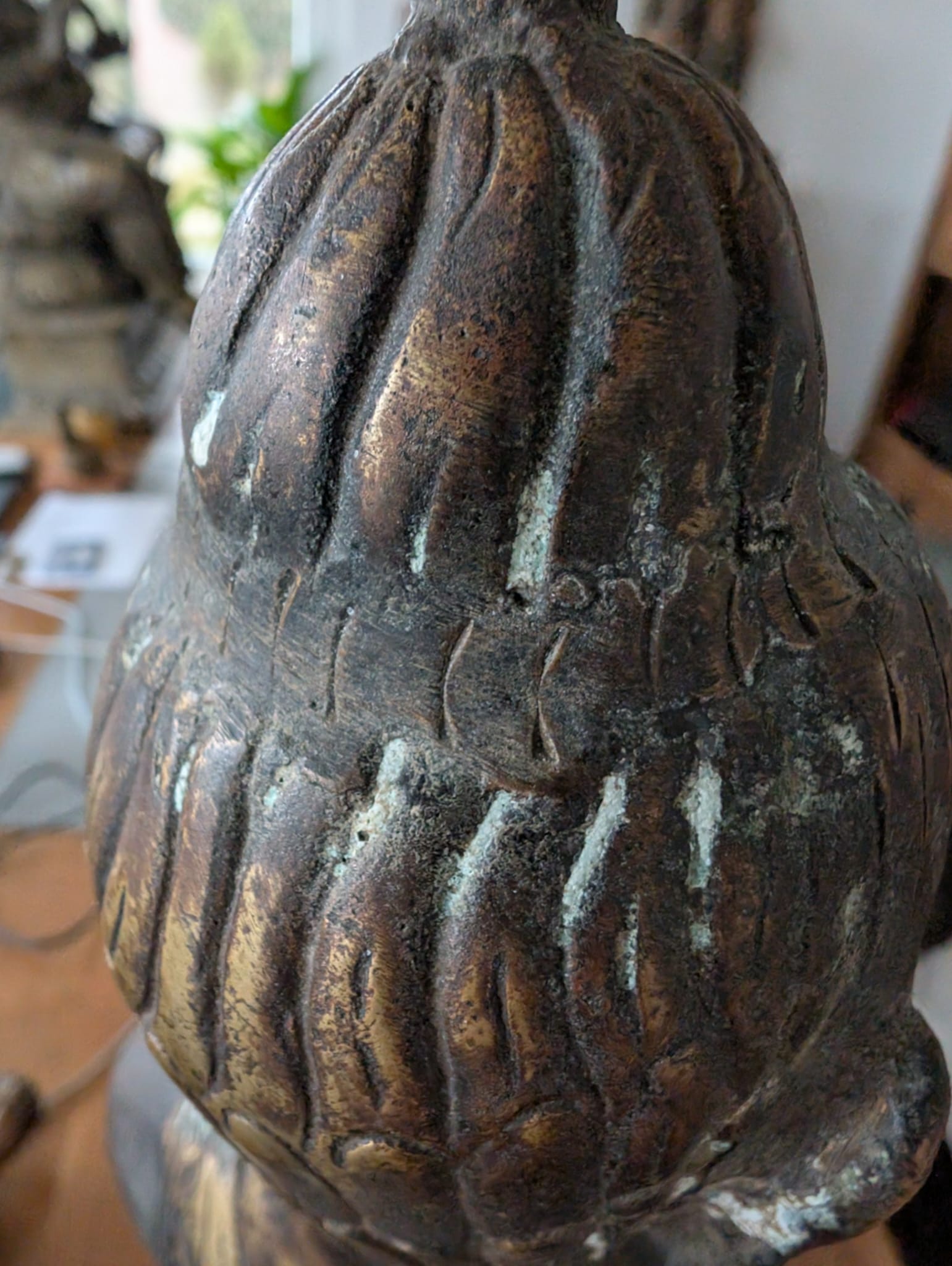 Himalayan bronze Buddha with old patina and surface texture