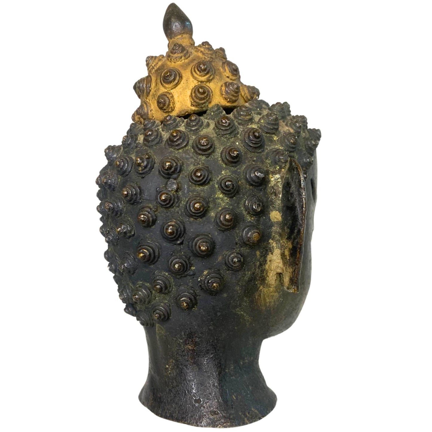 Rear view of the Buddha head with a focus on the detailed hair curls.