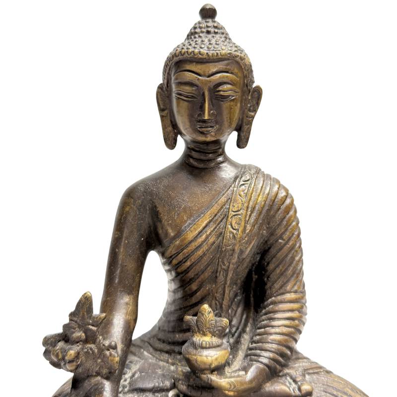 Bronze Buddha sculpture from Buddhist art tradition
