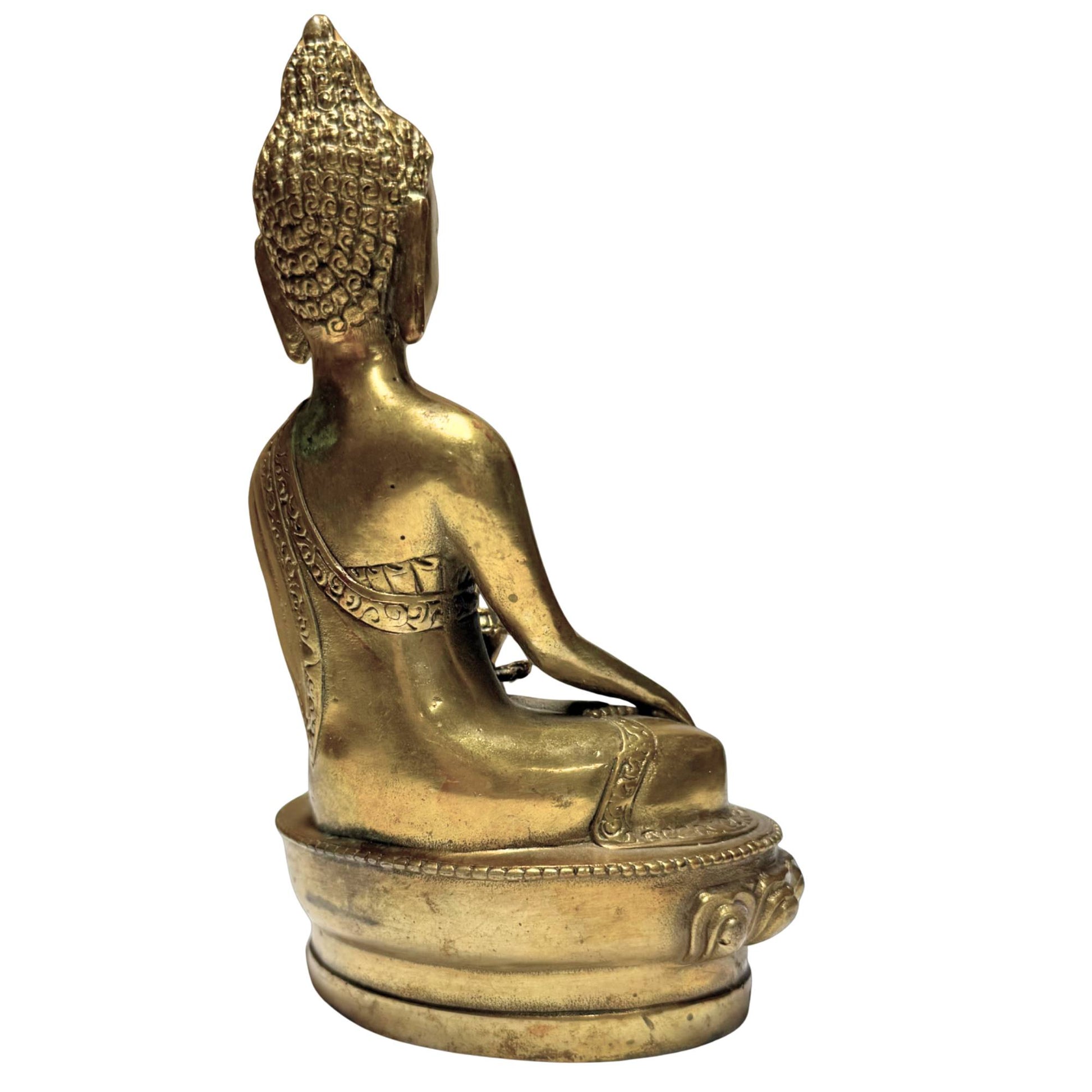 Bronze Buddha statue as a symbol of enlightenment, protection, and clear thinking