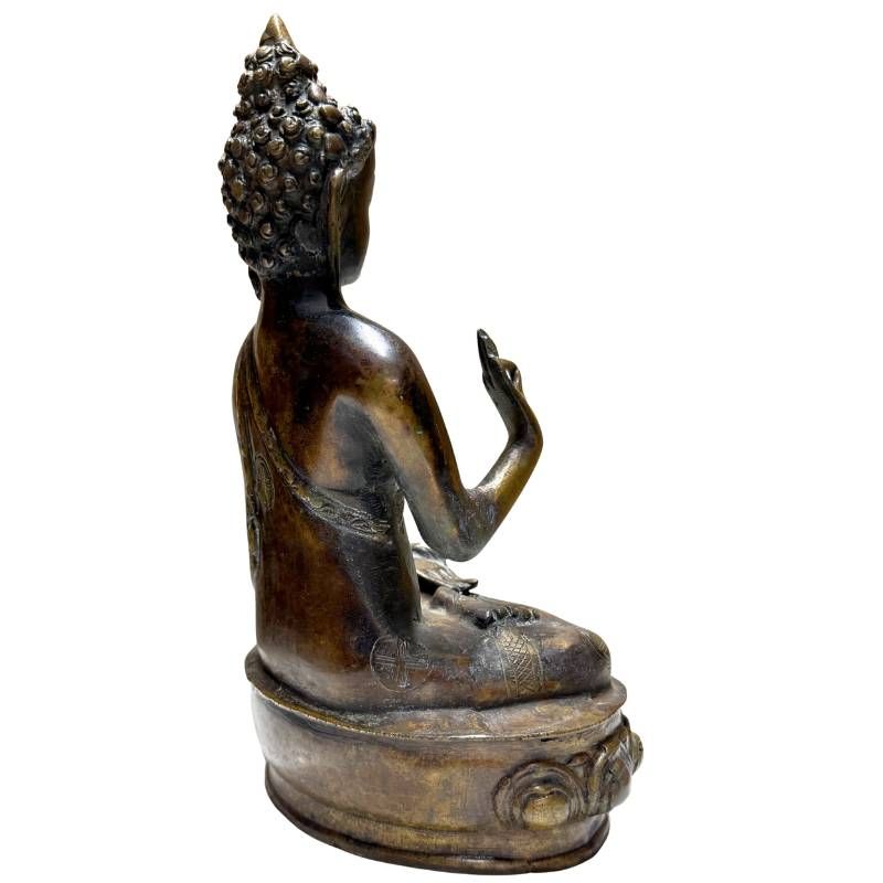 Antique bronze Buddha statue with a serene appearance for the interior