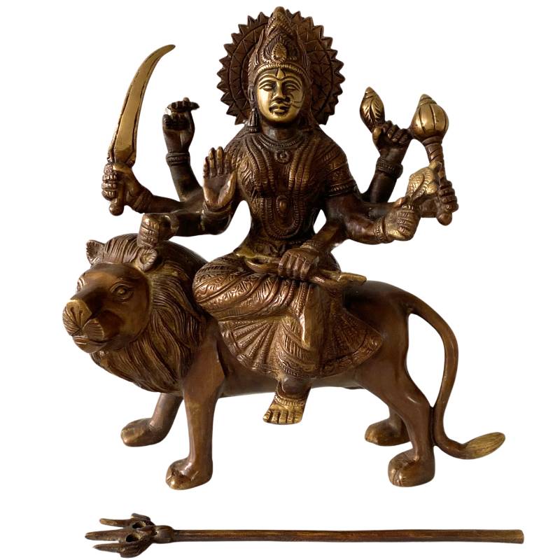 Bronze multi-armed Durga goddess seated on a lion – traditional Indian statue