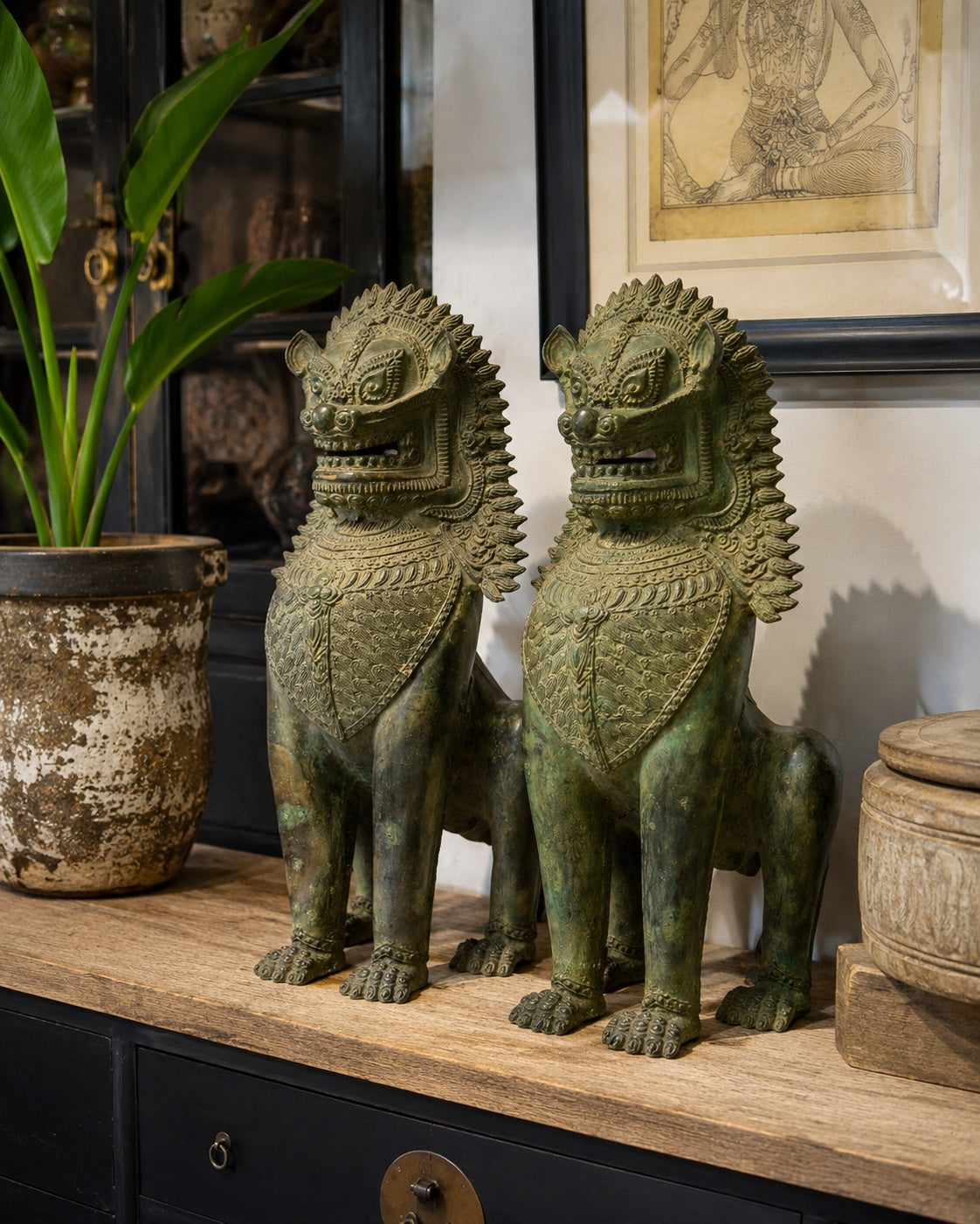 Historic bronze lion statues as powerful house guardians and spiritual objects