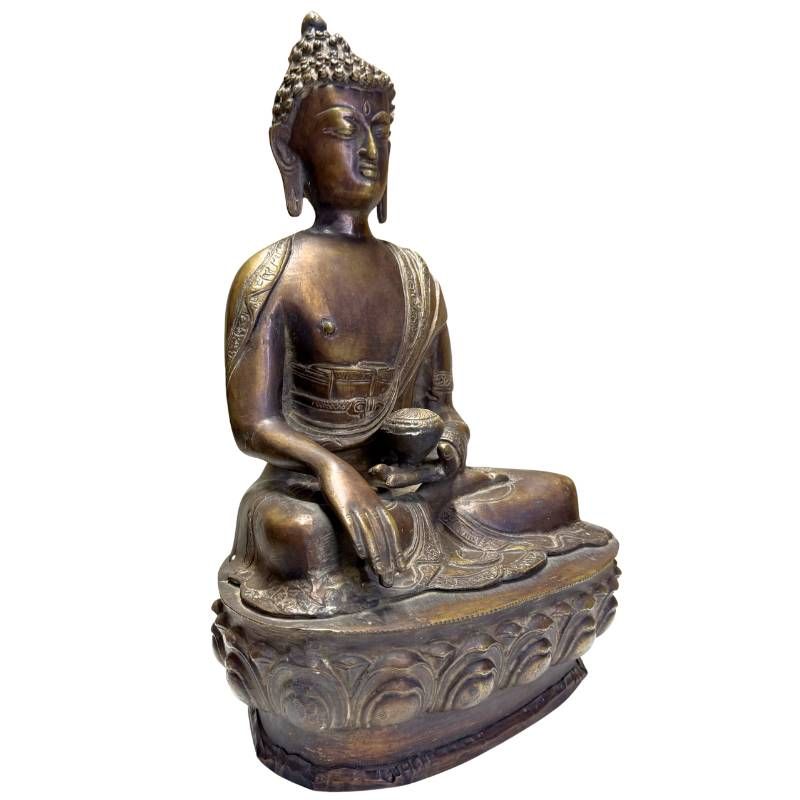 Front view of antique bronze Medicine Buddha with natural patina