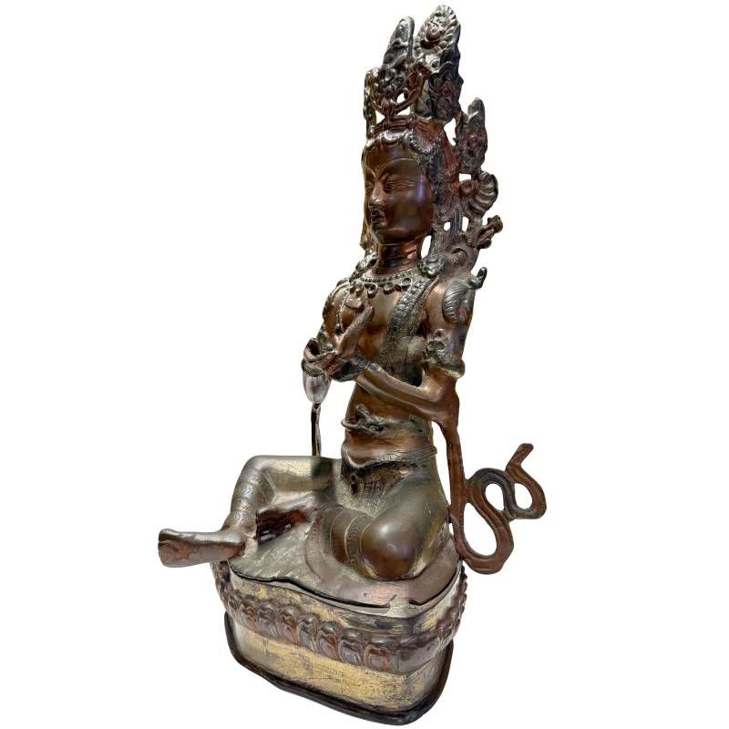 Antique bronze Tara on a lotus base from the Himalayan region
