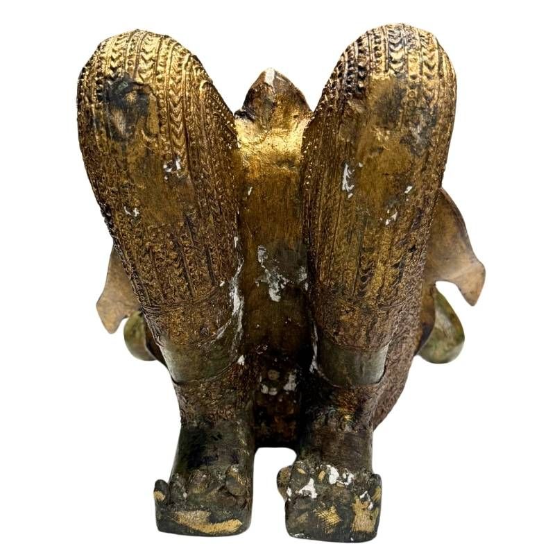 Thai bronze temple guardian as an antique interior object with character