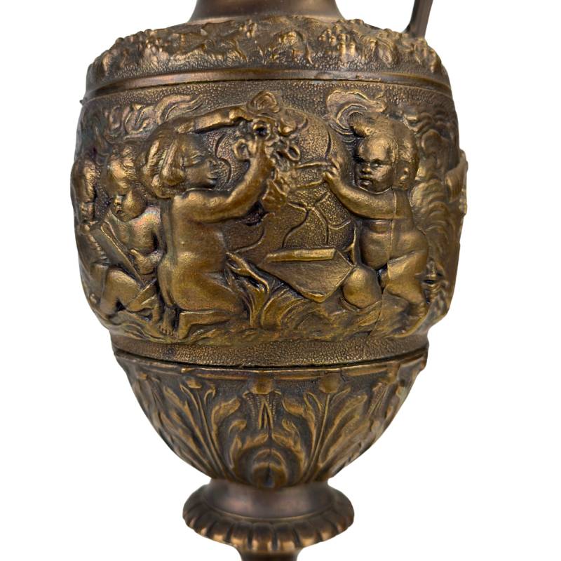 bronze vase jug with figurative reliefs and details