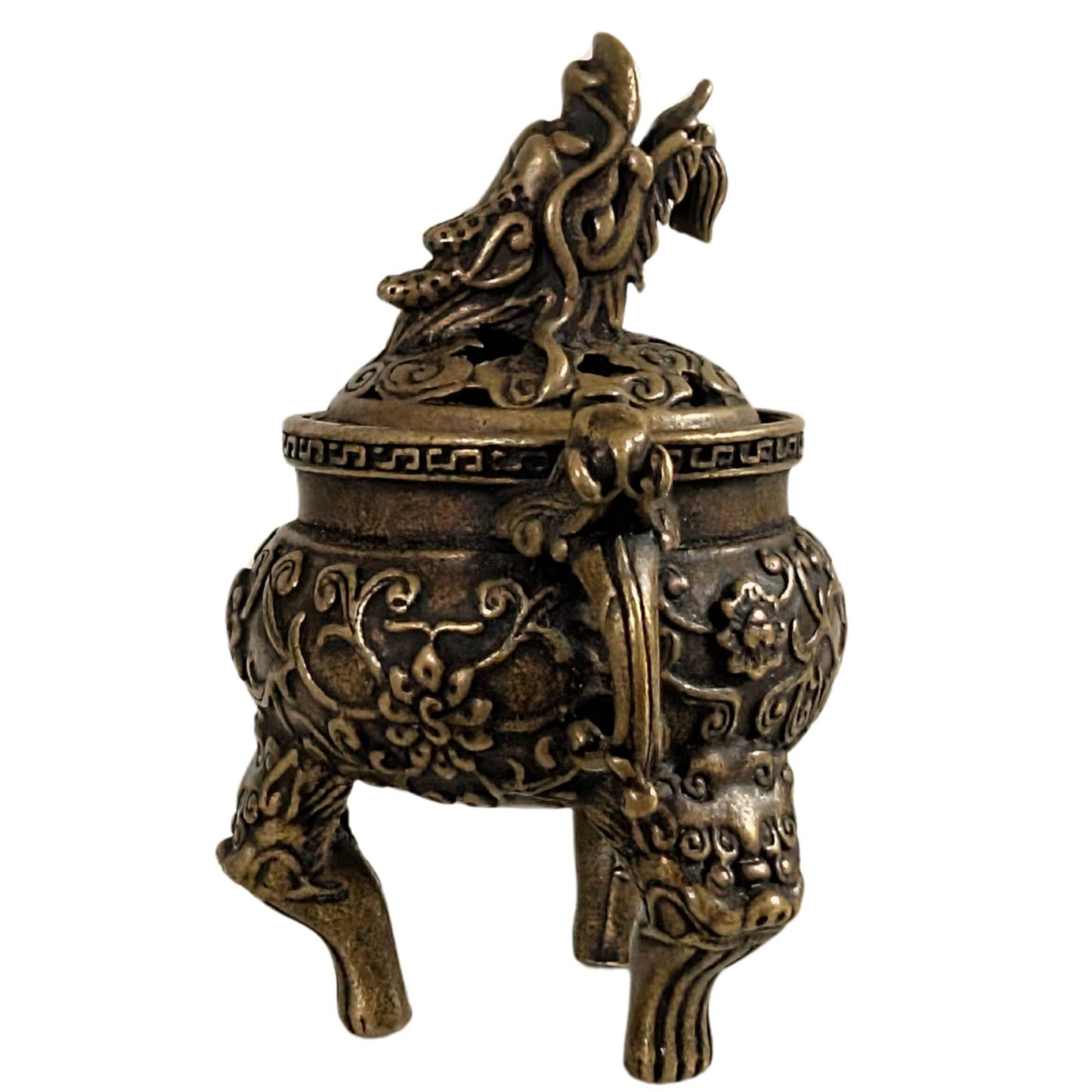 Handy bronze incense burner with floral relief and dragon decoration on top.